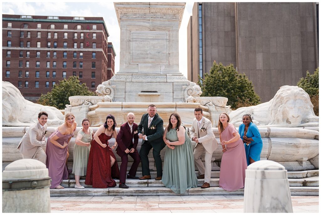 Brian and Jeff recreate the iconic scene from the show friends with their wedding party.