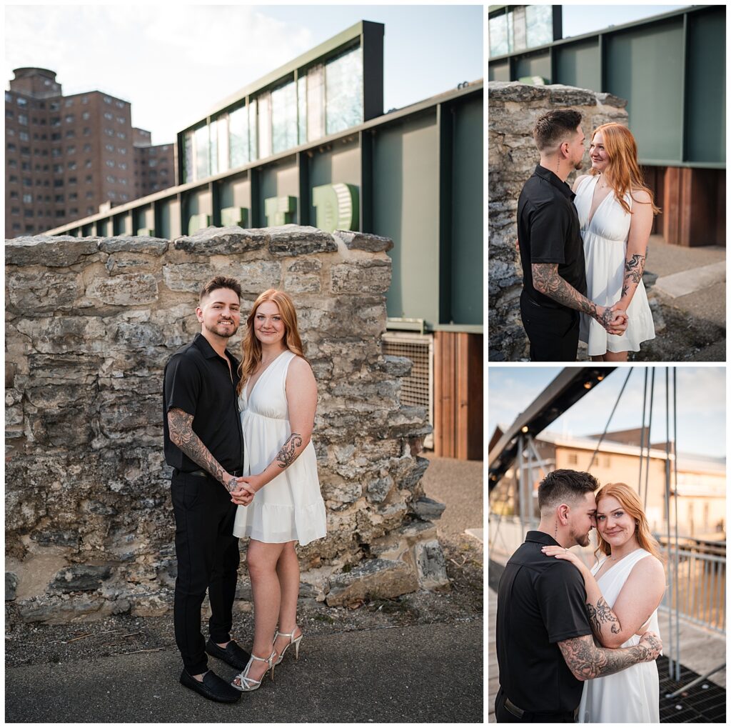 Emma and Nick pose in front of a green bridge at Canalside Buffalo