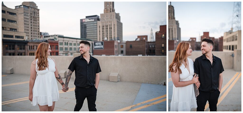 Emma and Nick walk together on top of a parking garage in downtown Buffalo NY