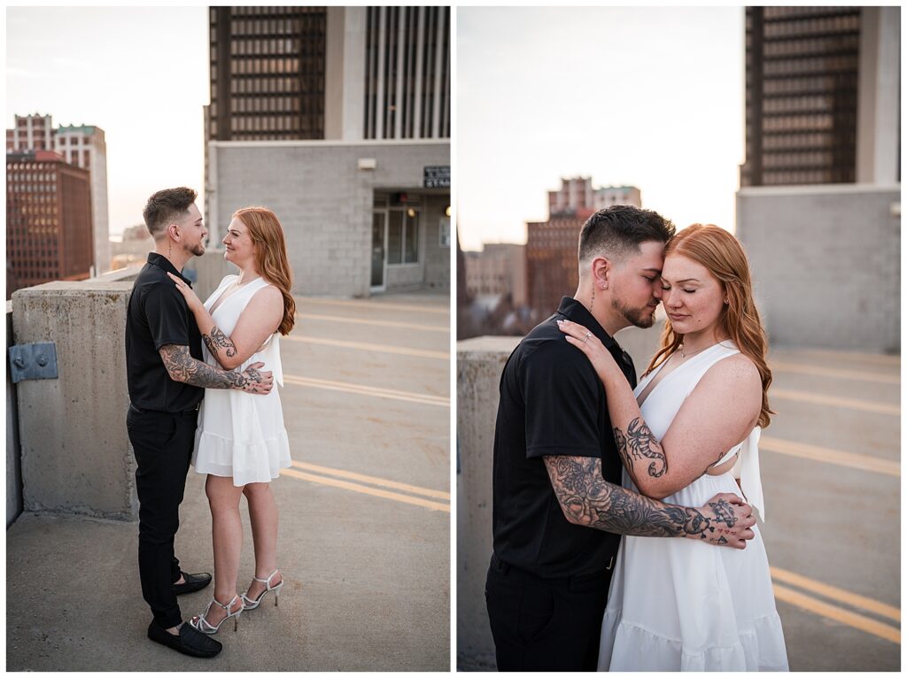 Emma and Nick pose on top of a parking garage in downtown Buffalo NY