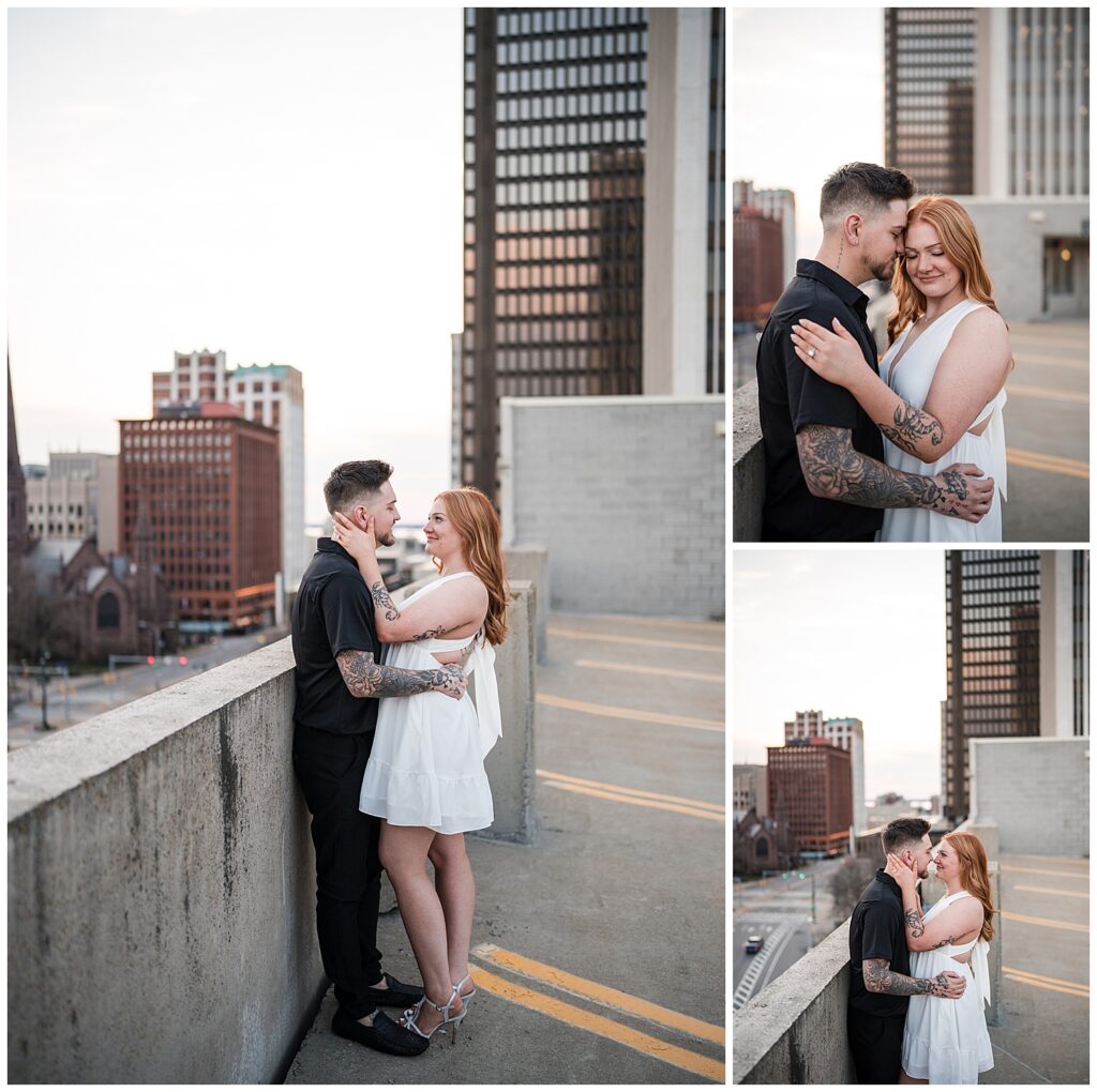 Emma and Nick pose on top of a parking garage in downtown Buffalo NY