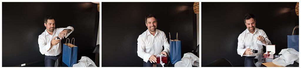 groom opens presents from his bride on the wedding morning