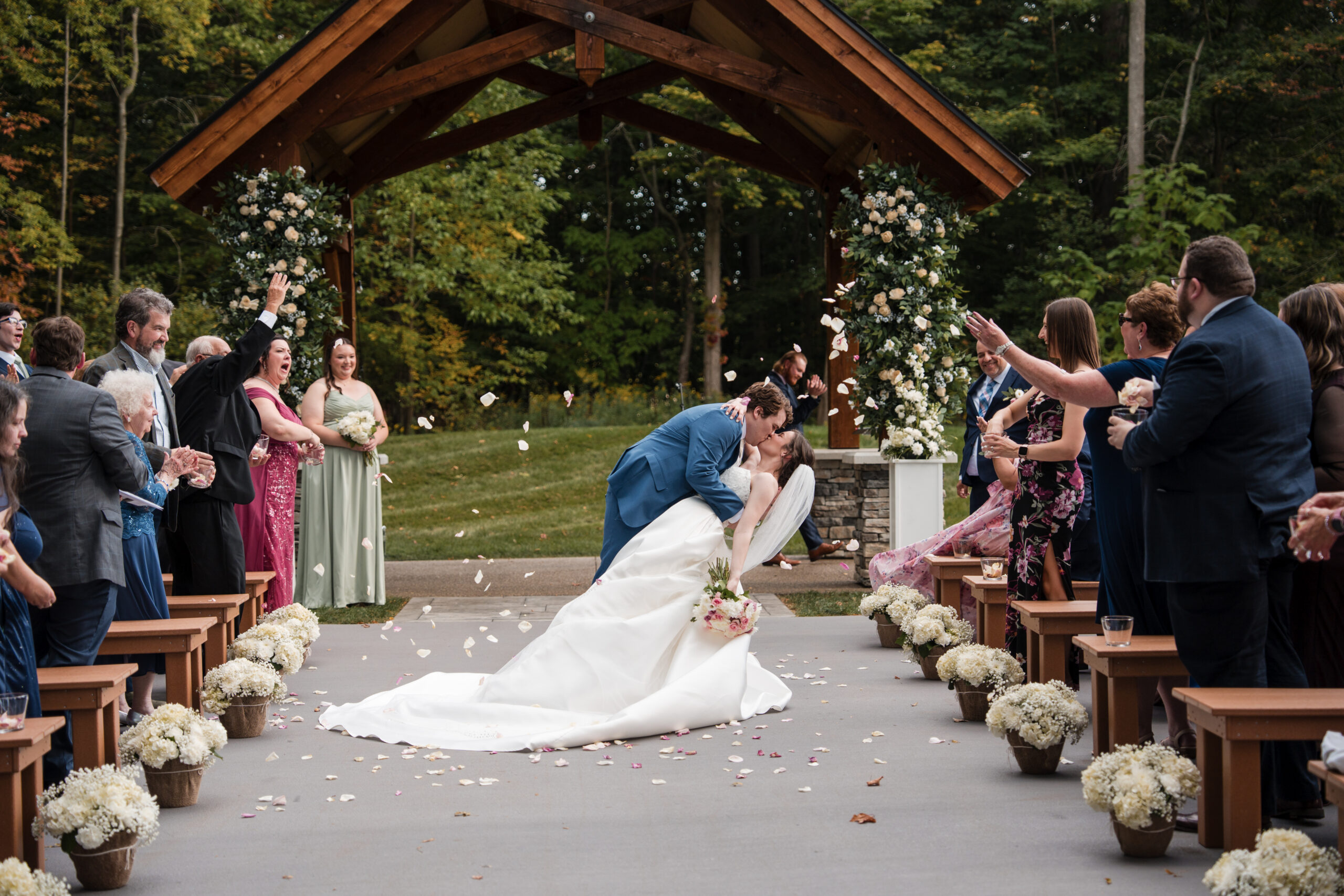 bride and grooms wedding ceremony at the legacy on 18 mile creek hamburg NY